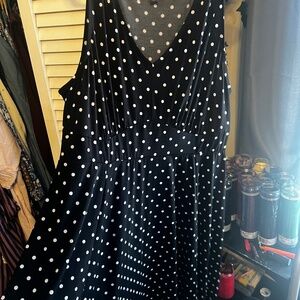 Sleeveless black polka dotted dress by torrid